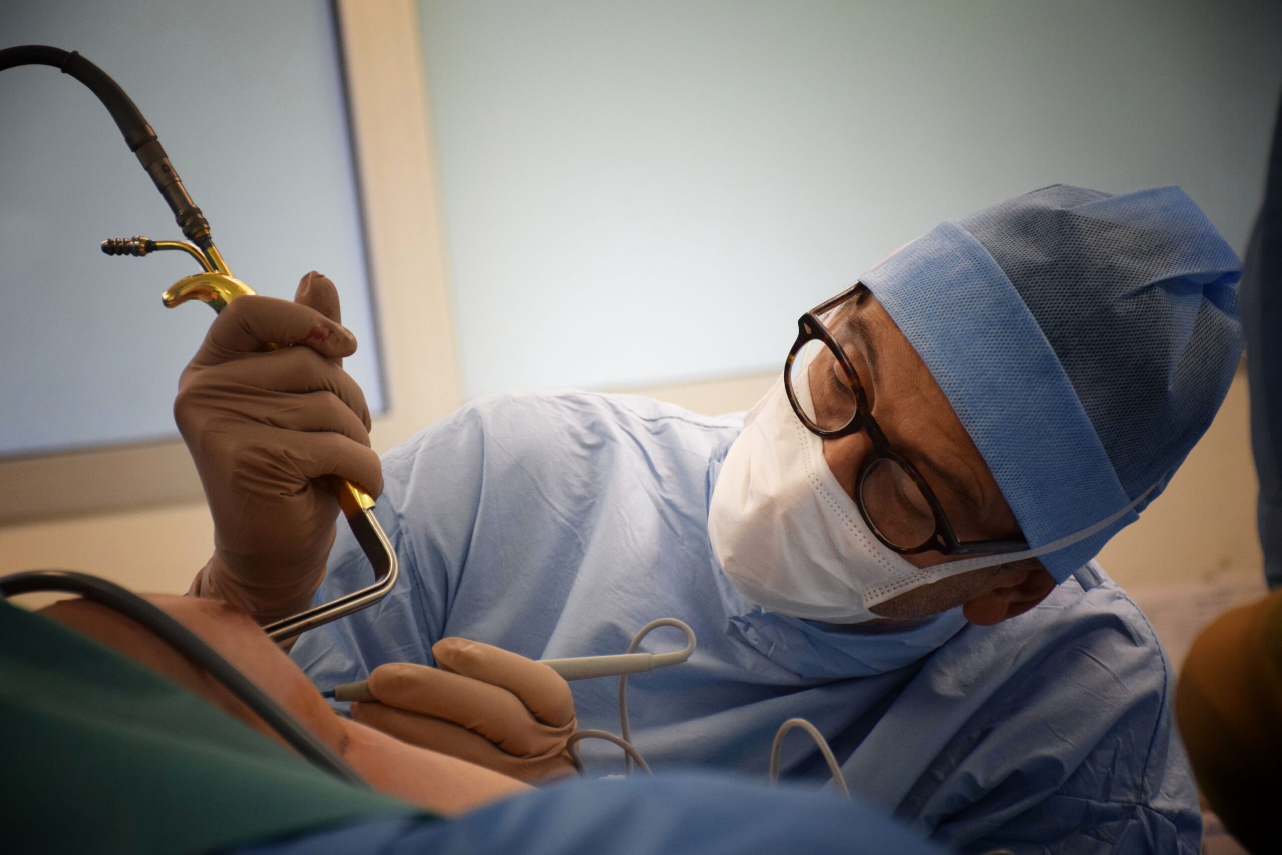 Dr. Philippe Spitalier performing surgery