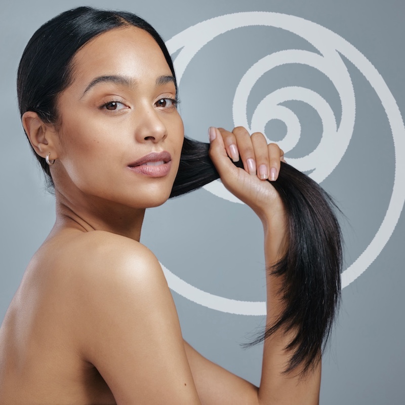 beautiful young woman holding her hair